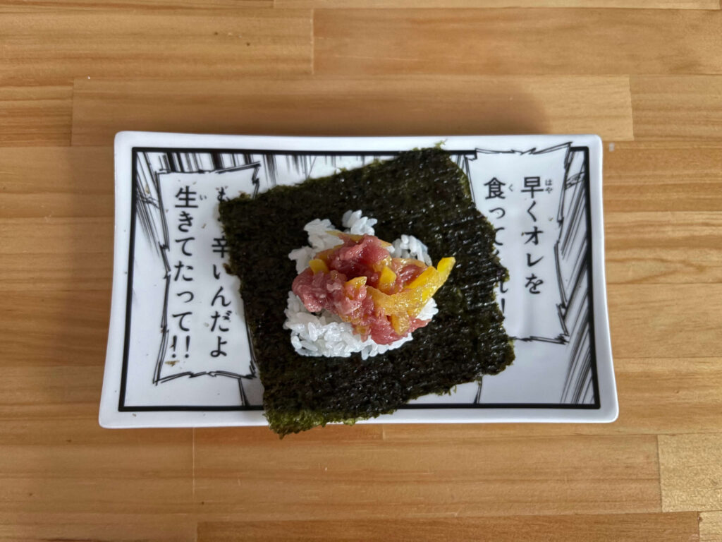 タイ巨人展で買ったお皿に載せられたトロたく